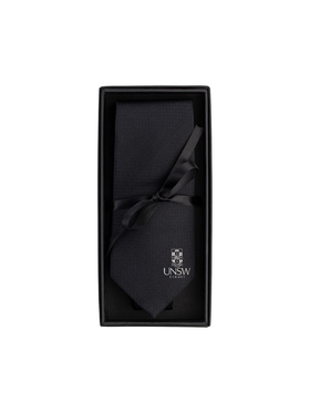 UNSW Silk Tie in solid black with a white logo - black