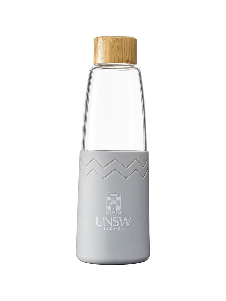 Glass SOL bottle with a bamboo lid and coloured silicon sleeve with the UNSW logo - cool grey colour